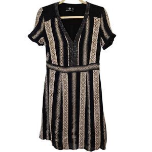 Rena Lange black and tan short sleeved lined dress.